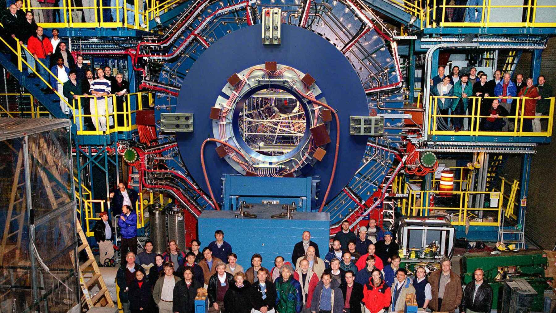 Scientists standing around the STAR detector at Brookhaven National Laboratory during a quantum physics experiment