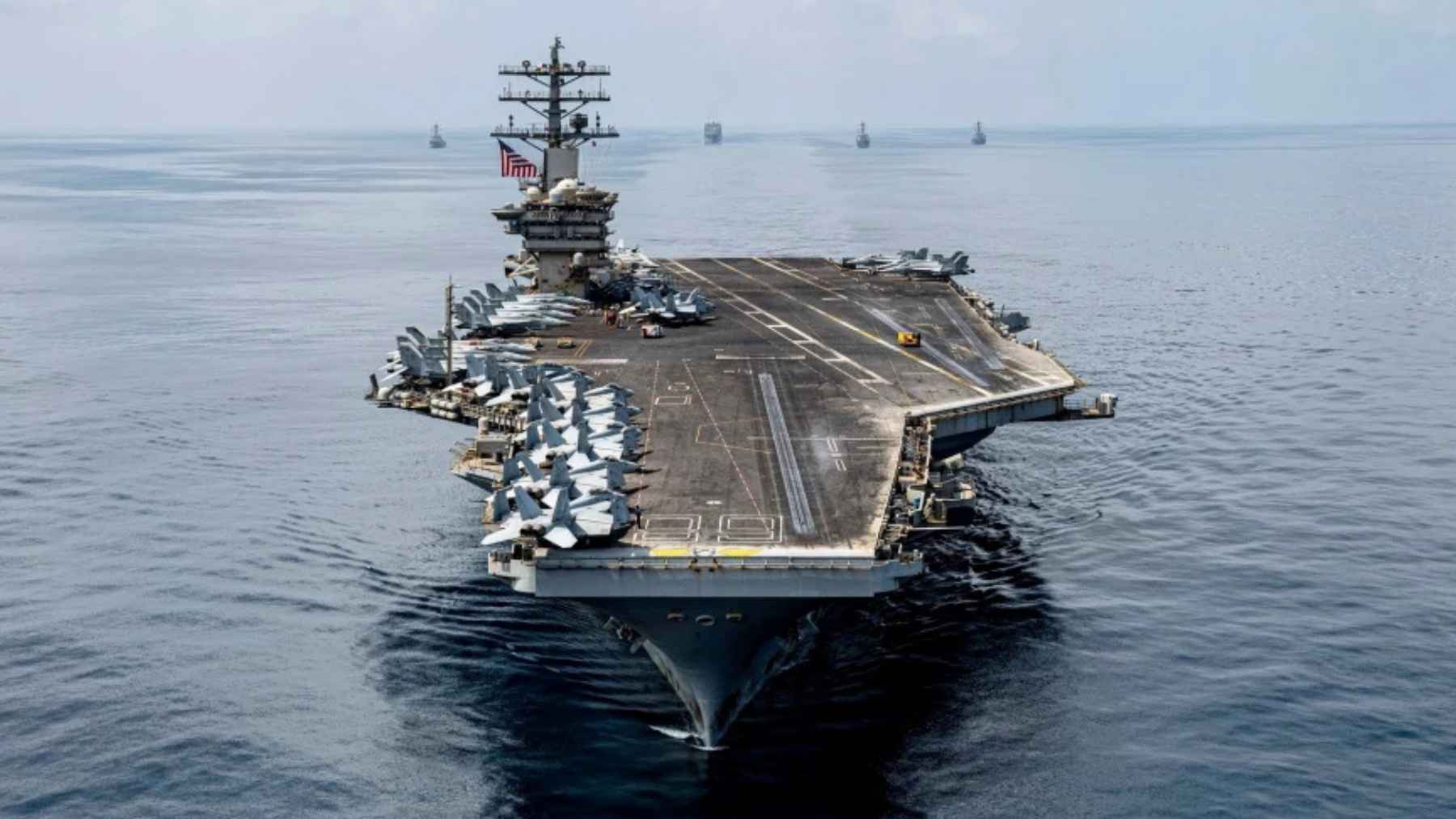 USS Nimitz aircraft carrier sailing near Panama during Southern Seas 2026 with fighter jets visible on deck