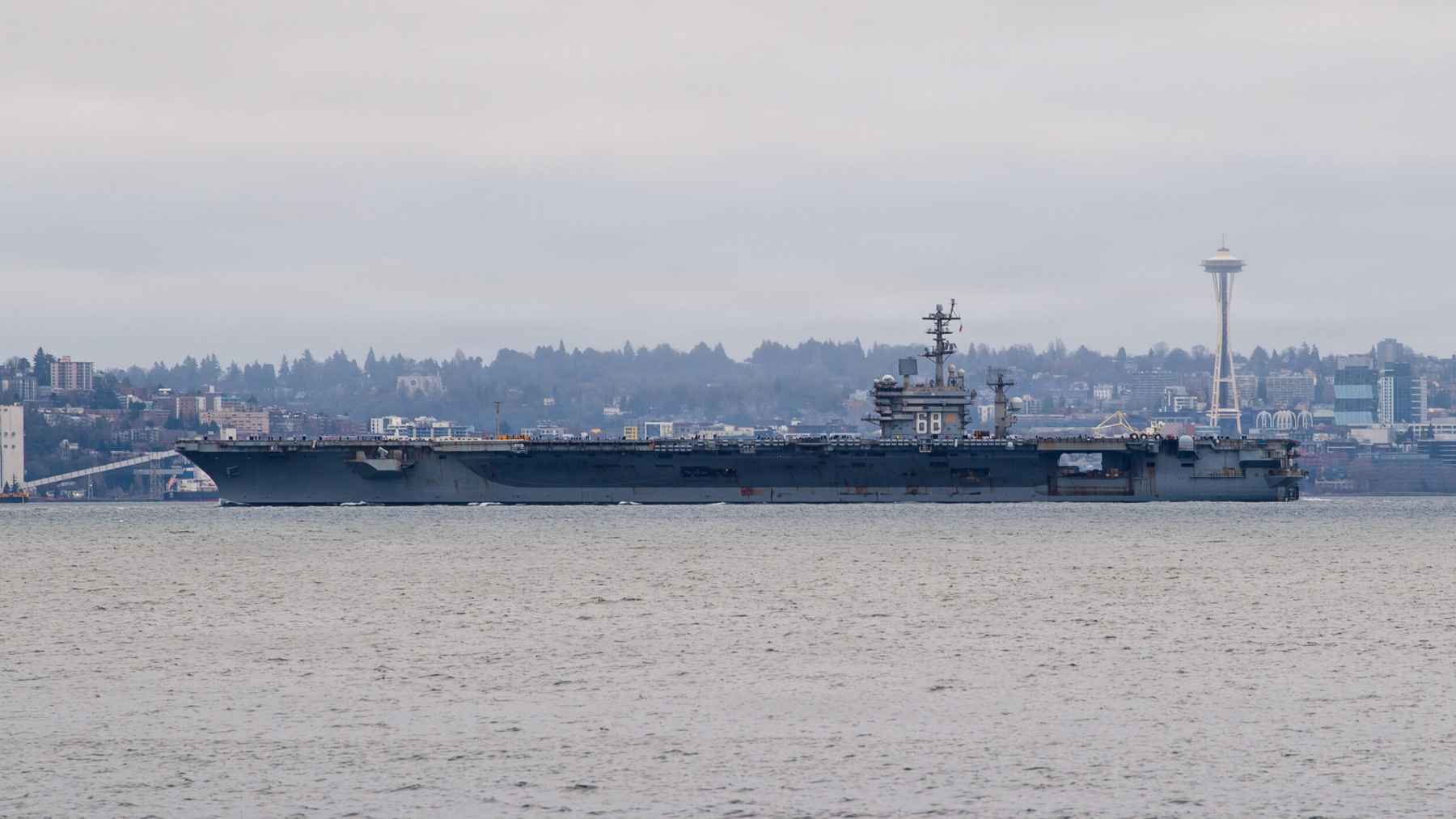 USS Nimitz aircraft carrier sailing near Seattle before its planned retirement and transition out of Navy service