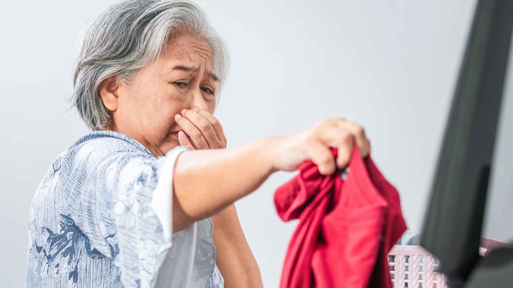 Worn socks on the floor highlighting hygiene risks and bacterial buildup from repeated use
