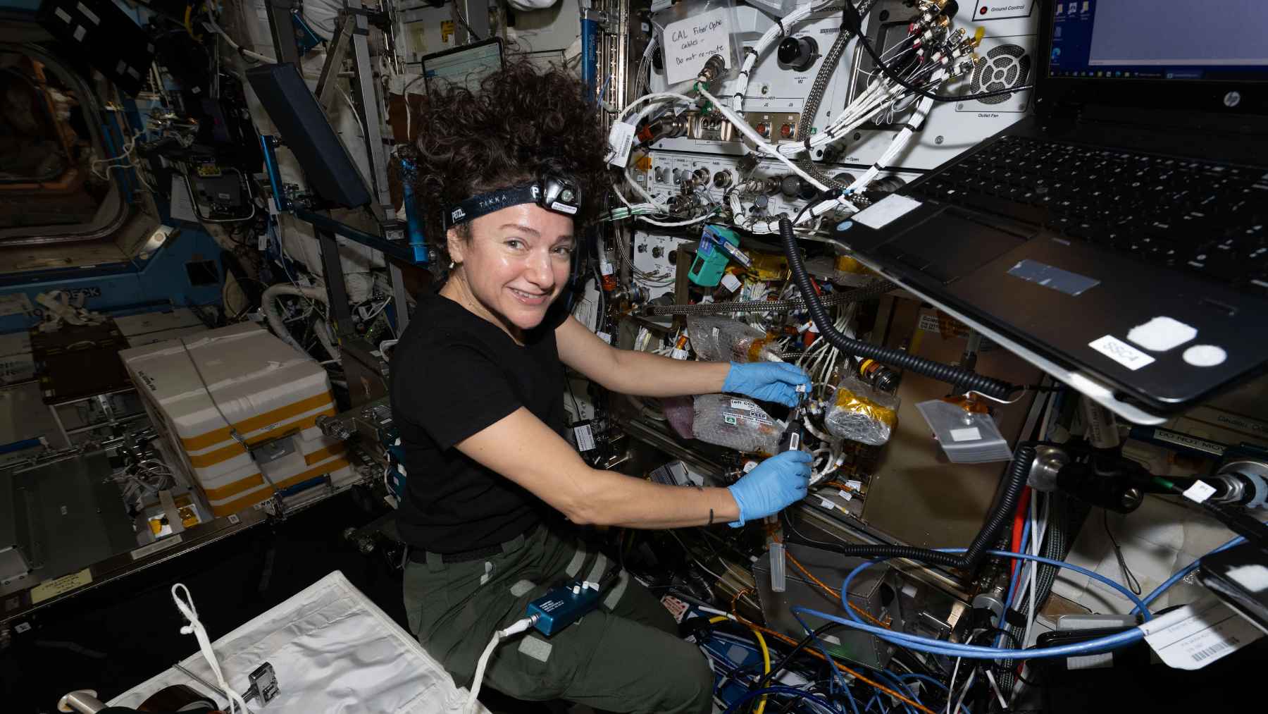 Astronaut Jessica Meir installs hardware upgrades on NASA’s Cold Atom Lab aboard the International Space Station to support advanced quantum physics experiments.
