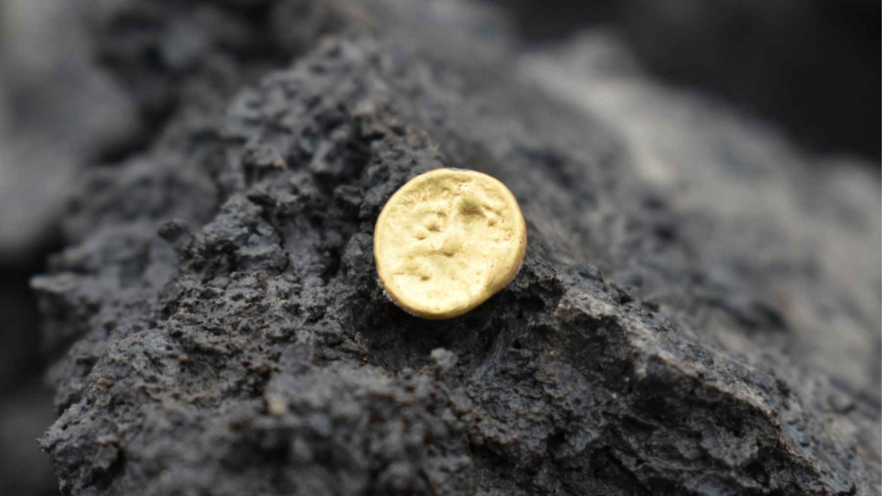 ECOnews 1 A small Celtic gold coin found in soil during an archaeological discovery near the D35 highway in the Czech Republic.