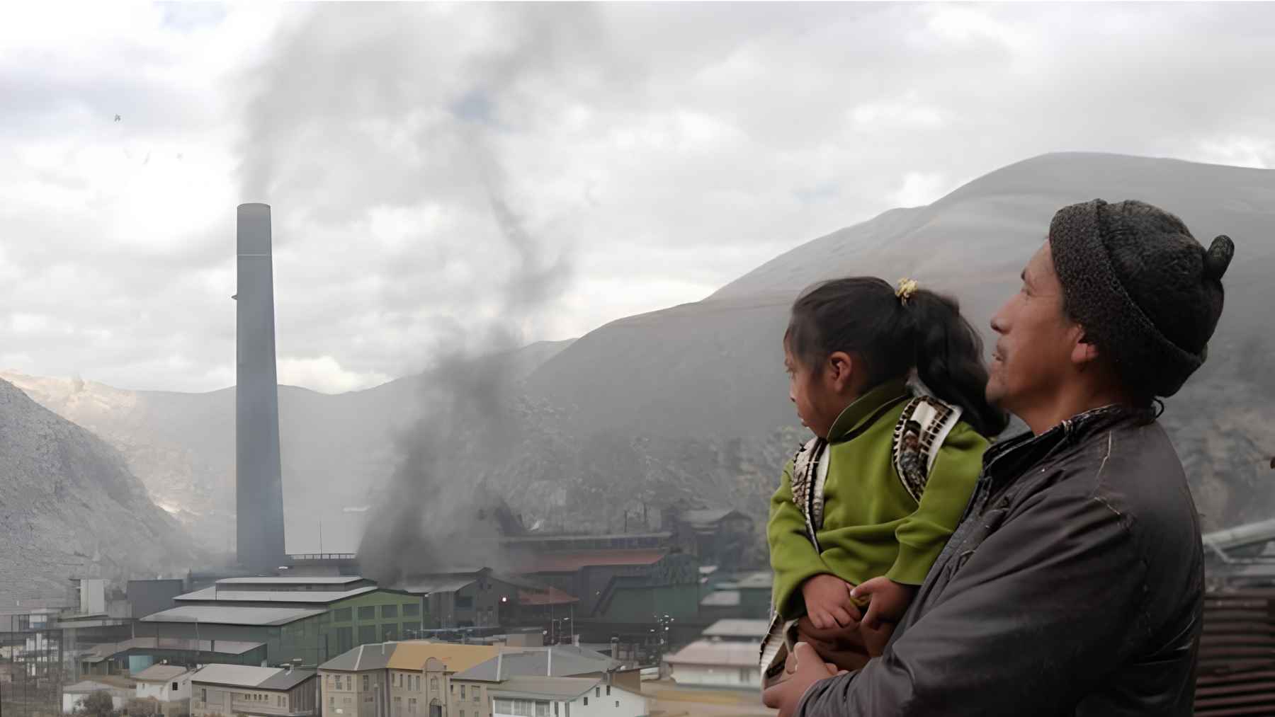 Mother and child overlook mining pollution in Cerro de Pasco, Peru