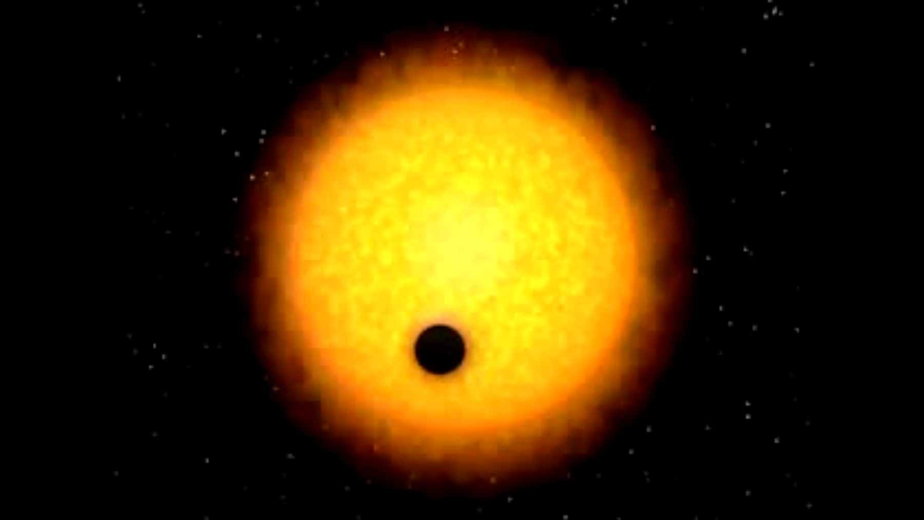 An archival photo of a small four-inch telescope housed in a modest wooden shed, which was used to detect the transit of an exoplanet.