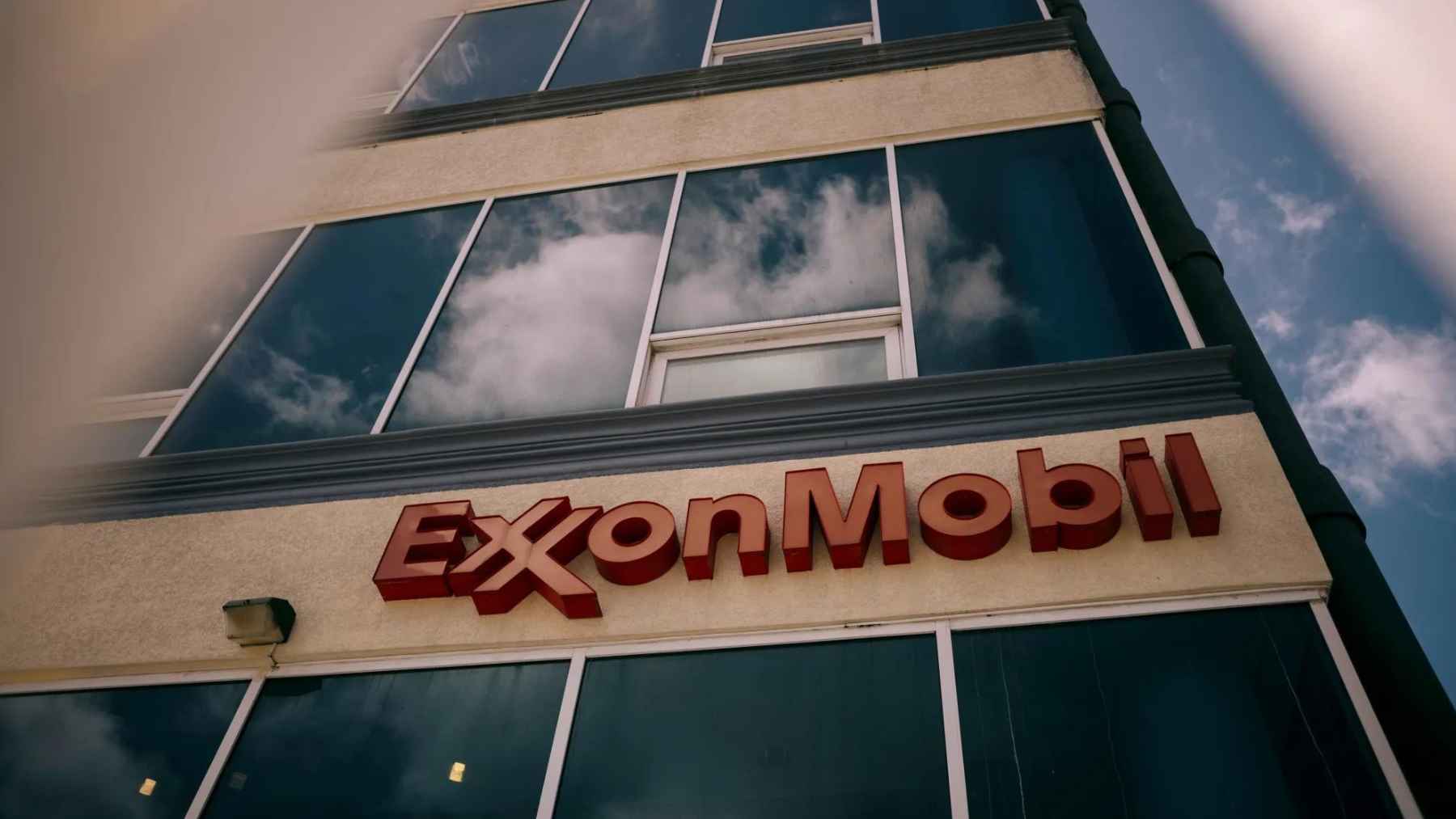 ExxonMobil office building facade showing company logo as firm shifts legal home to Texas