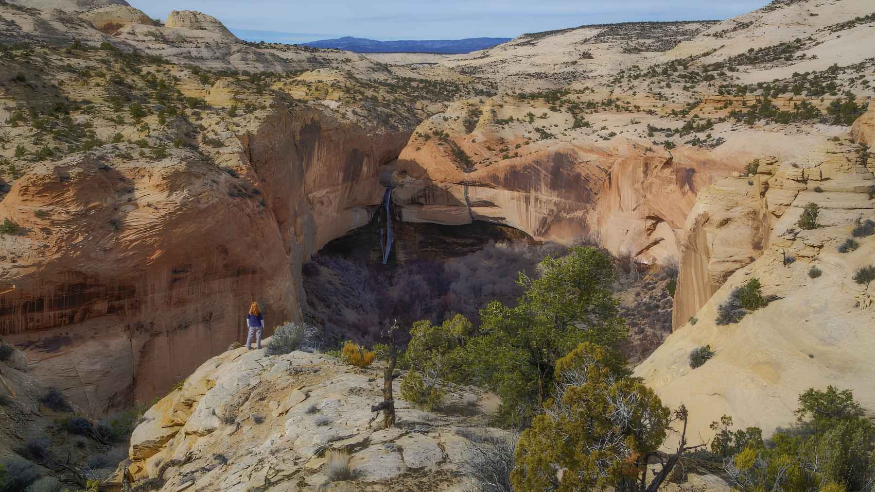Wide view of red-rock canyons and desert cliffs in Grand Staircase-Escalante National Monument, Utah.