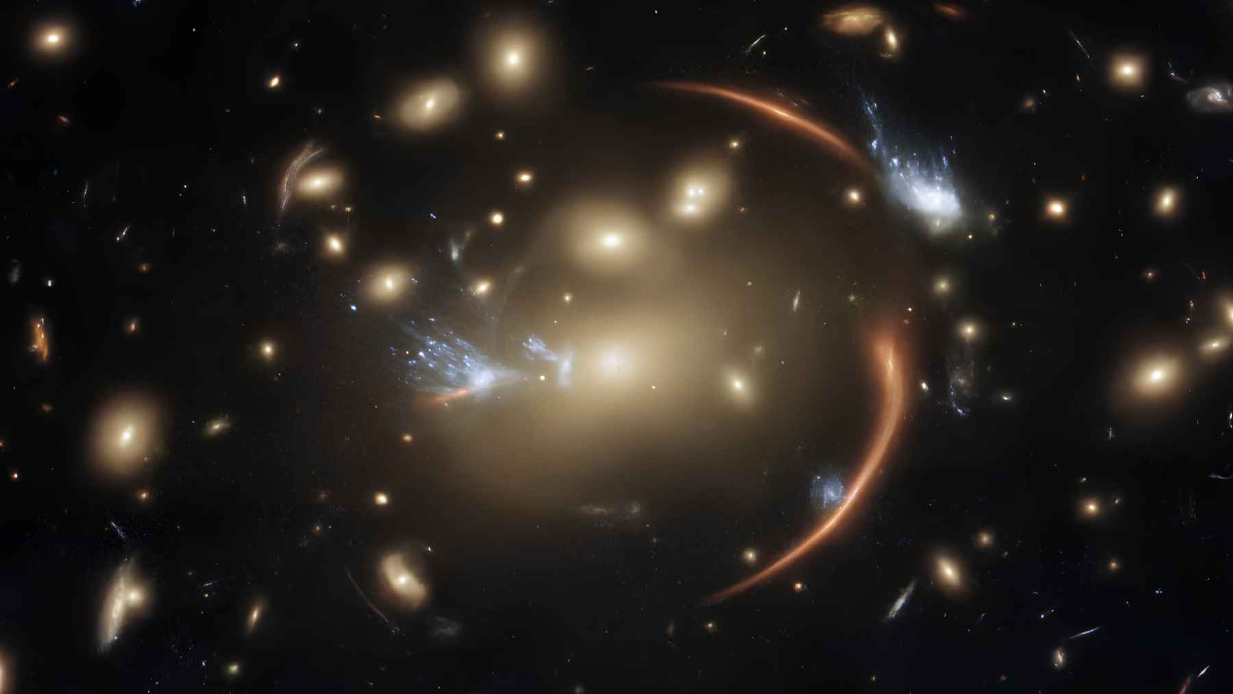 Gravitational lens arcs reveal distant galaxy linked to high-energy neutrino detection