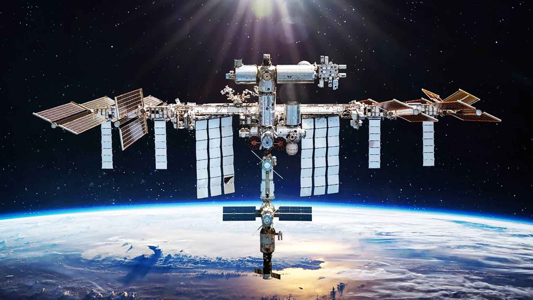 International Space Station orbiting above Earth, home to NASA’s Cold Atom Lab quantum experiments