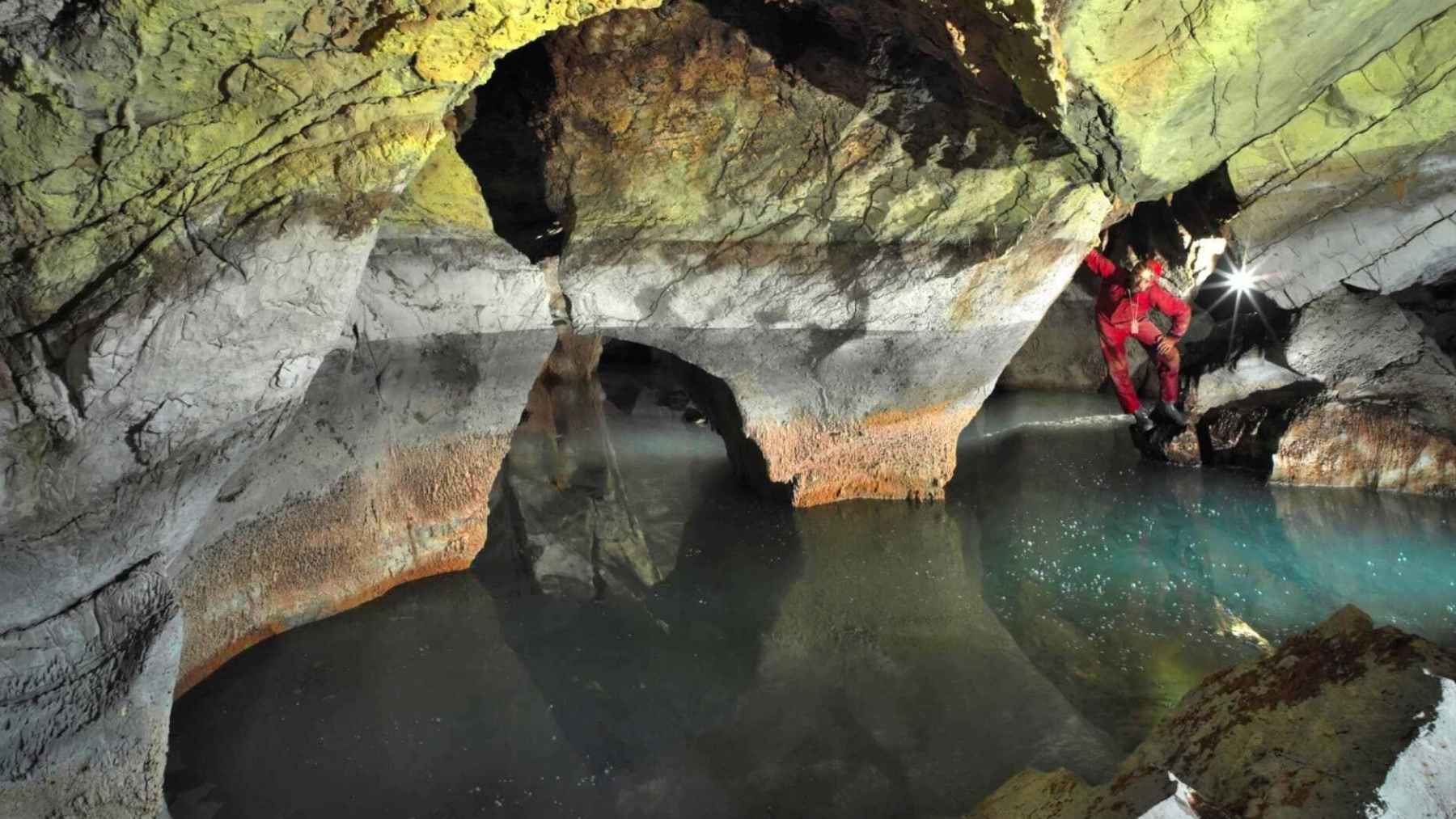 Researchers say they’ve found the world’s largest underground thermal lake in Albania, a turquoise basin about 417 ft. deep hidden inside a cave system near the Greek border 1 Researchers explore Lake Neuron inside Atmos Cave in Albania, home to the world’s largest known underground thermal lake.