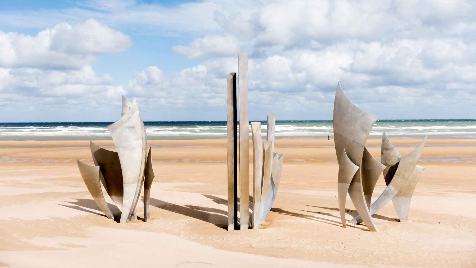 Geologists studied sand from the D-Day beaches in Normandy and uncovered a lingering signature of wartime debris, proof that history can stay embedded in the shoreline for decades 1 Les Braves sculpture stands on Omaha Beach in Normandy, one of the main D-Day landing sites during World War II.