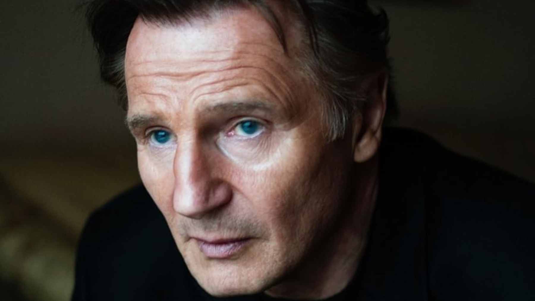 A portrait of actor Liam Neeson, reflecting on themes of aging, connection, and the challenges of making new friends in adulthood.