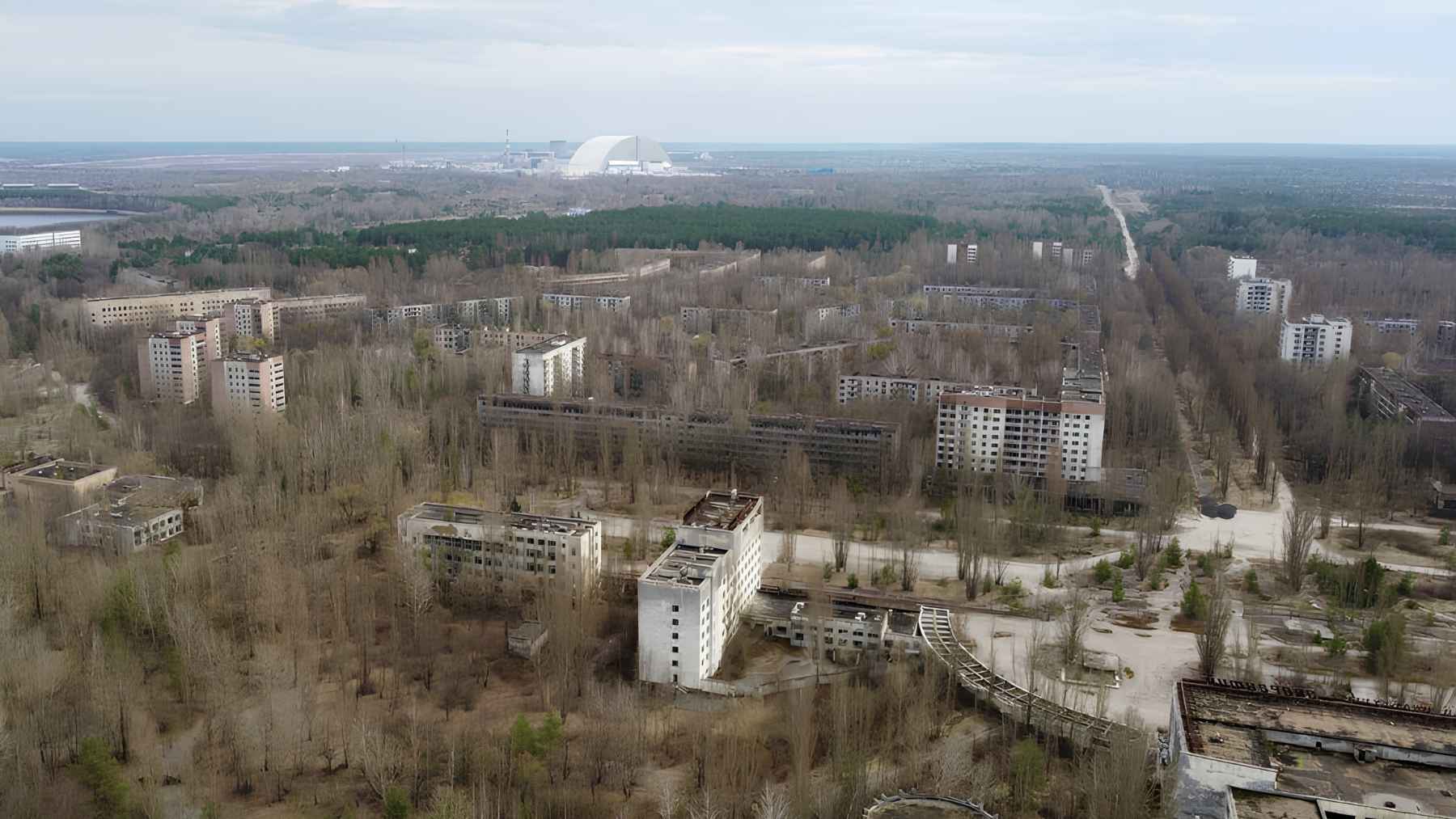 Aerial view of Pripyat with the Chernobyl reactor in the distance inside the exclusion zone.