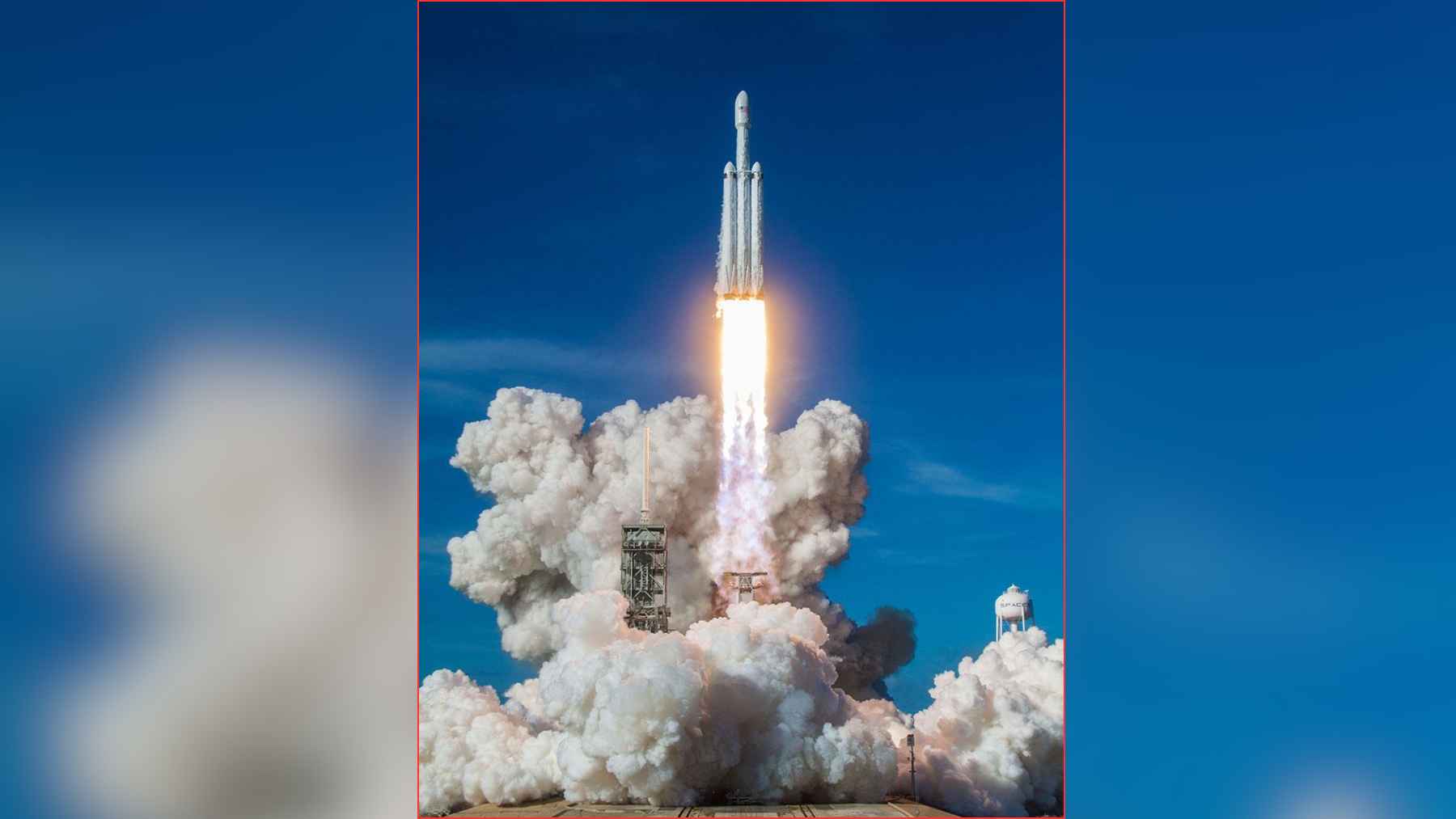 A SpaceX Falcon Heavy rocket launches into the sky, representing the scale and investor excitement surrounding the company’s valuation surge.