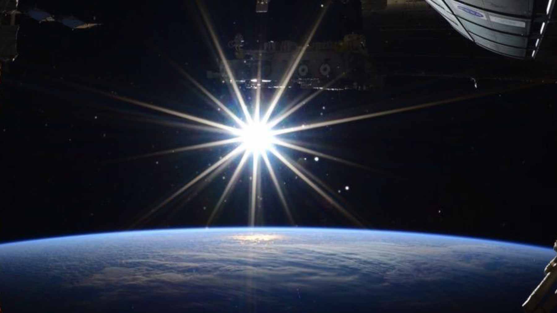 The Sun may look yellow from Earth, but seen from space it’s actually white, and our atmosphere is what tints it with that familiar color 1 A view of the Sun as seen from space, appearing as a brilliant, pure white sphere against the black background.