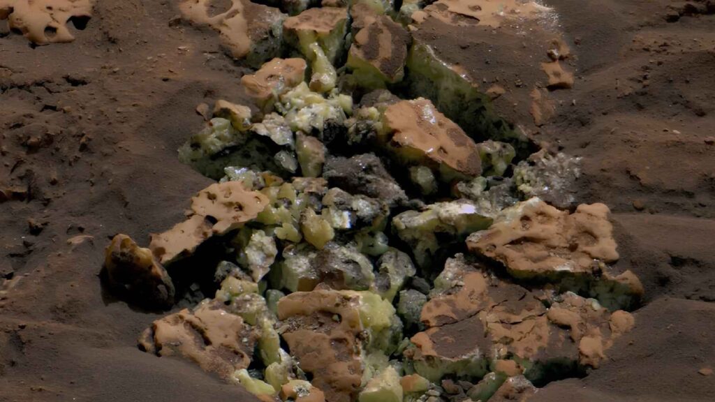 Close-up of bright yellow sulfur crystals exposed inside a cracked Martian rock by NASA's Curiosity rover