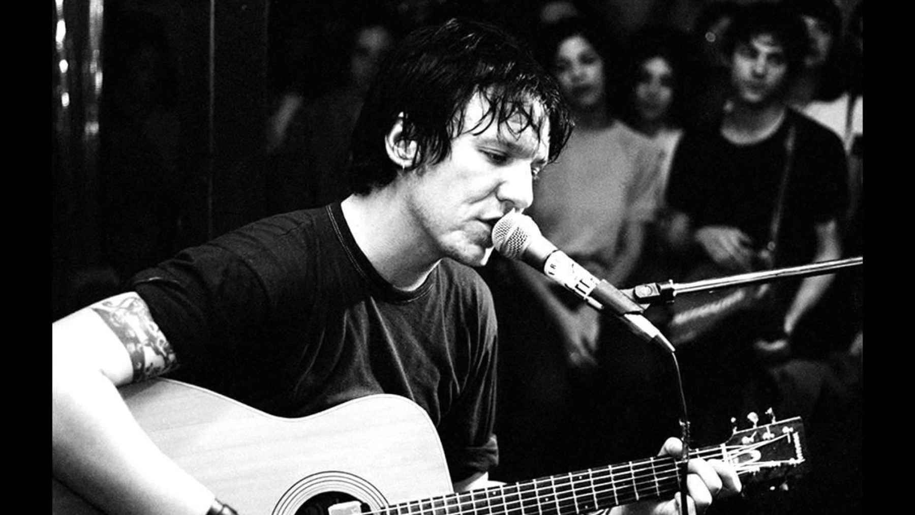 Portrait of Elliott Smith, whose legacy is honored with the official naming of minor planet 861969 Elliottsmith.