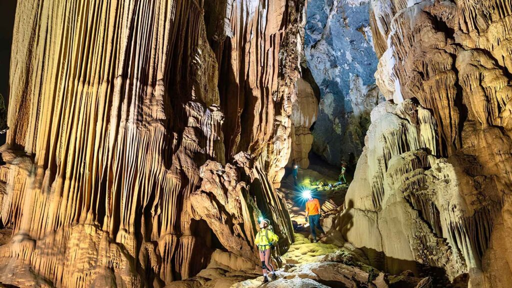 Towering stalactites and massive chambers inside Thang Cave in Vietnam.