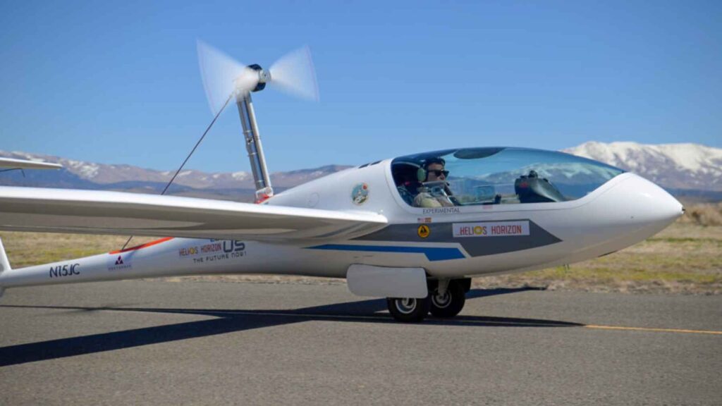 Pilot inside Helios Horizon electric aircraft on runway before or after a test flight using advanced battery technology