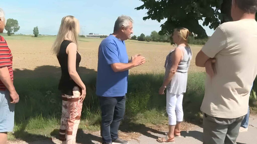 Residents in northern Italy discuss proposed solar farm project on farmland near their homes.