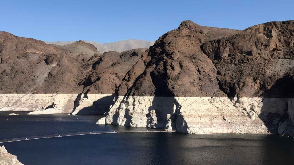 The white bathtub ring around Lake Mead reveals years of declining water levels caused by prolonged drought.
