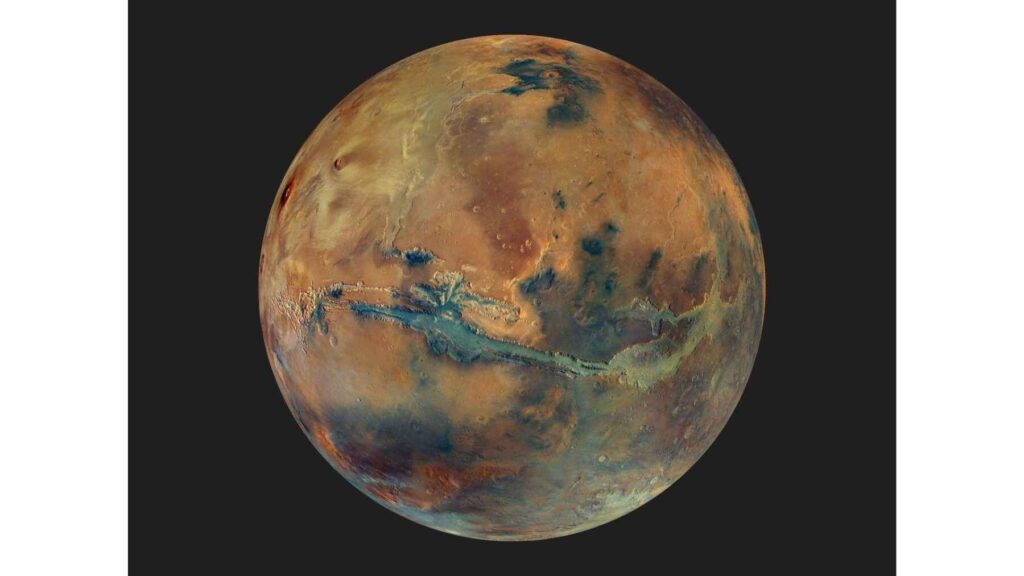 Global view of Mars showing the planet's surface, where scientists believe ancient water and part of its early atmosphere may remain trapped inside rocks and clay minerals.