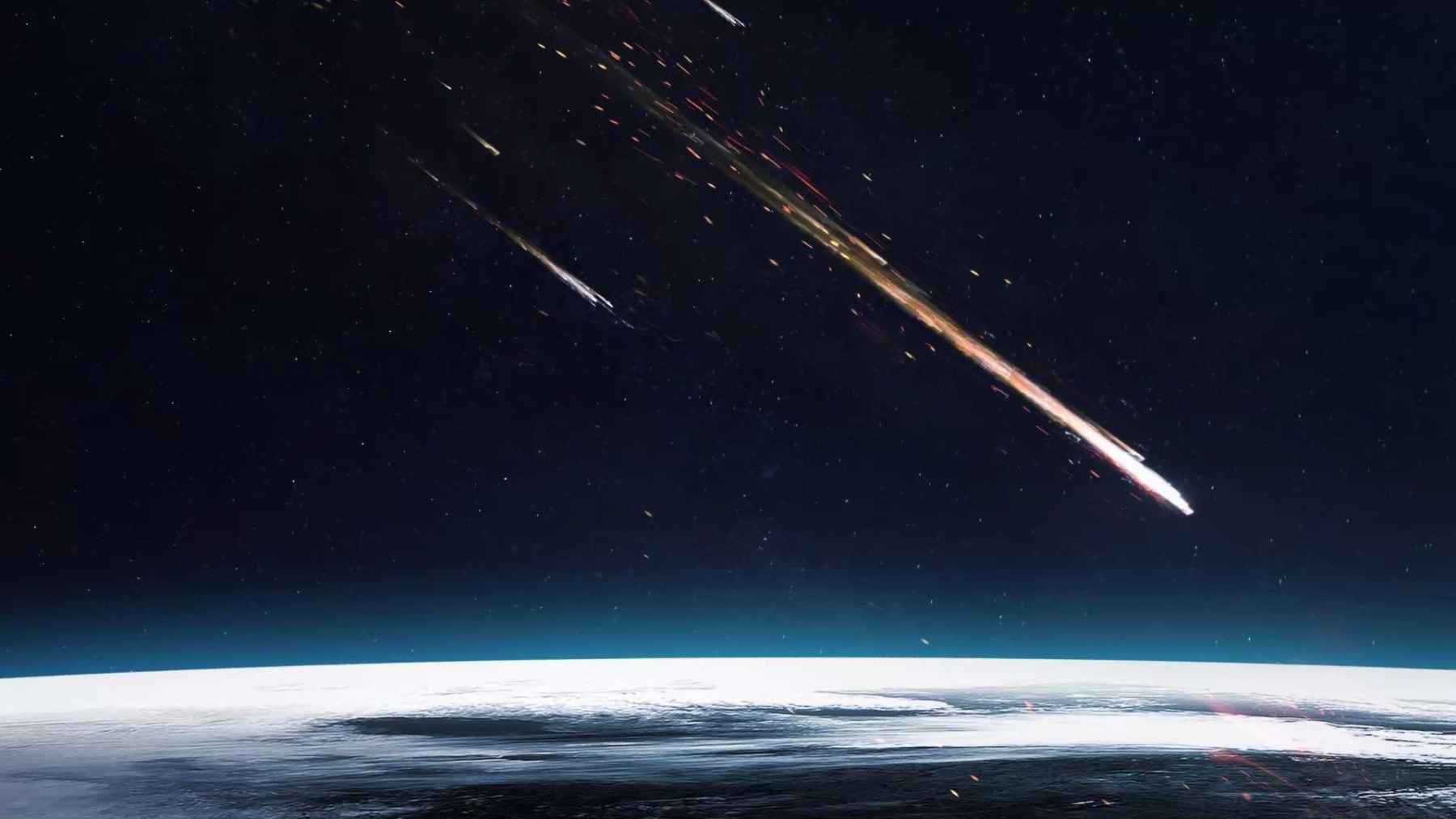 Bright meteor fireball breaking apart in Earth’s atmosphere, creating a sonic boom event.