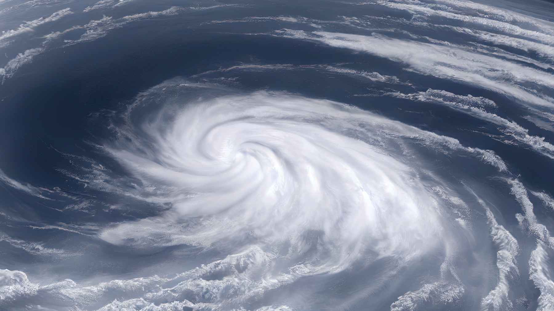 NASA is developing and testing an artificial intelligence system that identifies 93% of the signs of a flash flood and could provide crucial time to respond 1 Large storm system swirling over the ocean in a satellite-style view from above Earth.