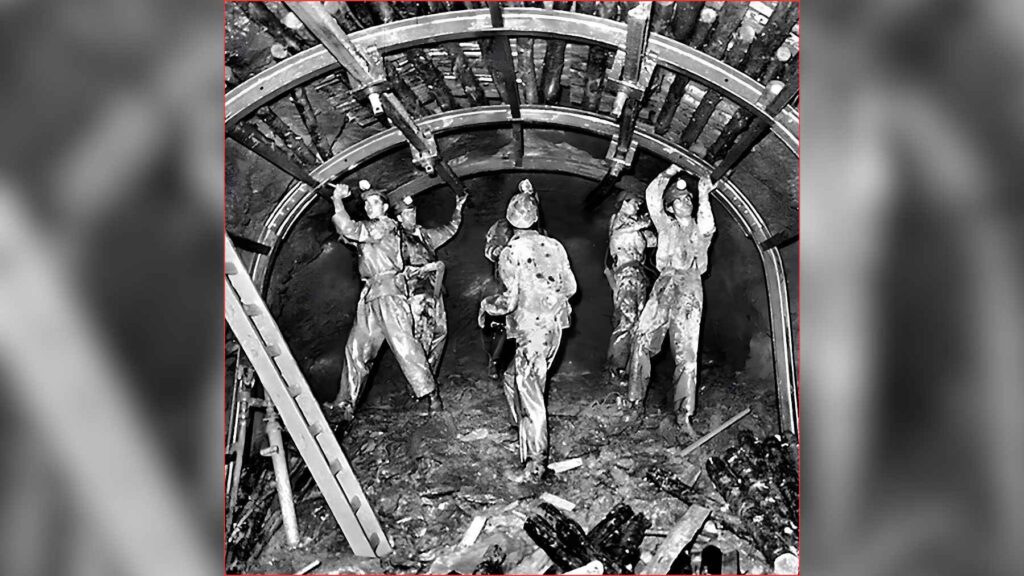 Historic photograph of miners working inside the Schlema-Alberoda uranium mine operated by Wismut in eastern Germany.