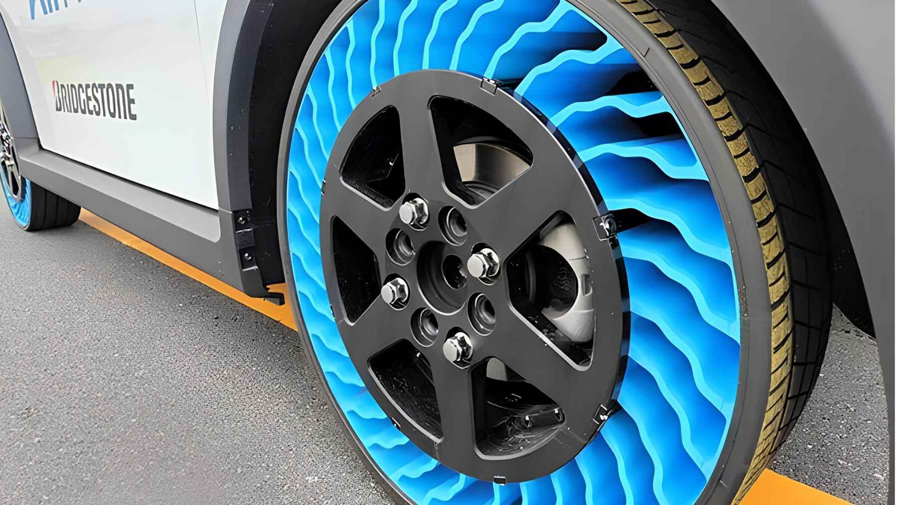 Close-up of the Bridgestone AirFree tire showing its recyclable spoke structure instead of an air-filled chamber.