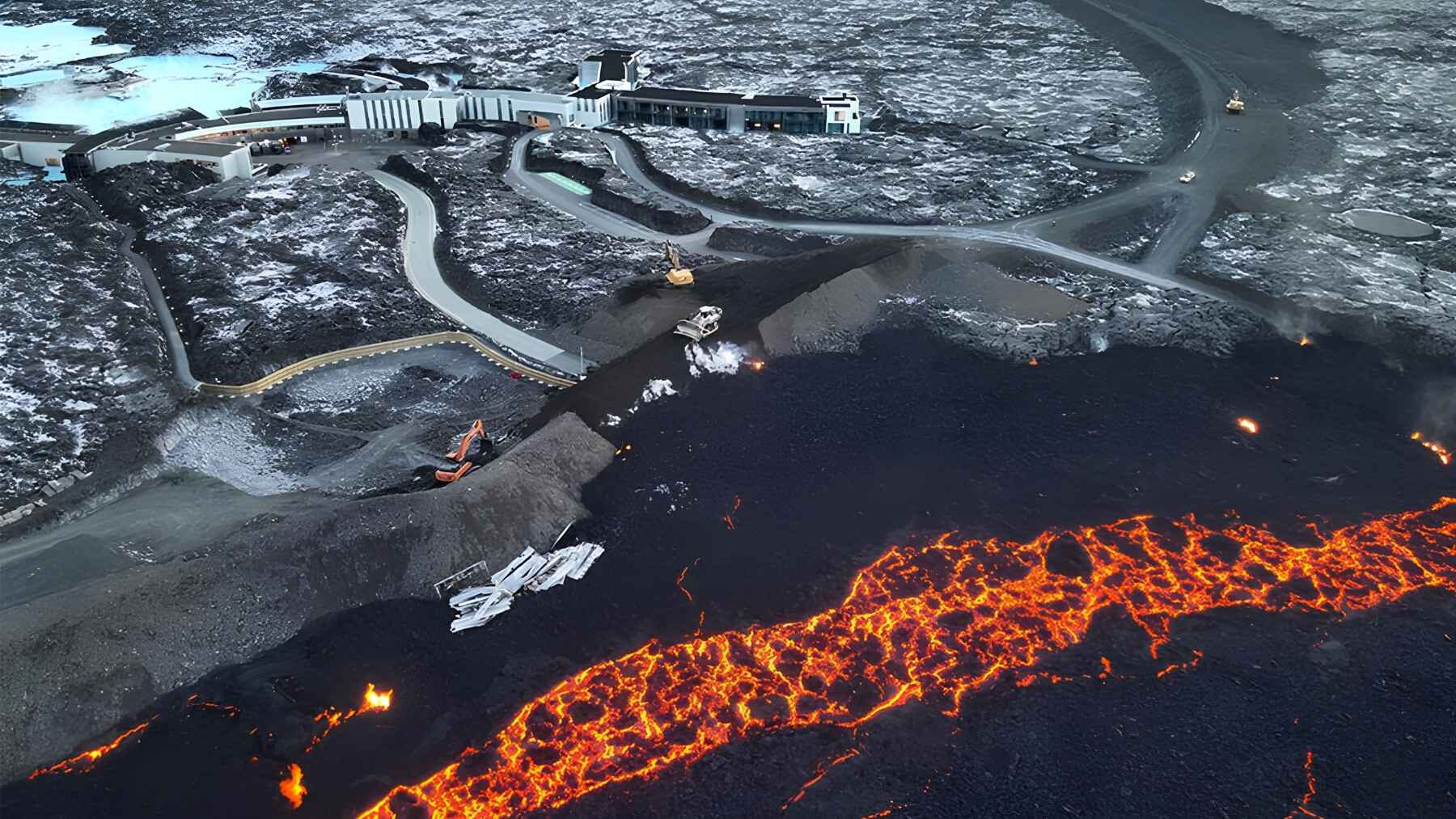 Lava reaches a protective barrier near the Blue Lagoon during an eruption on Iceland's Reykjanes Peninsula.