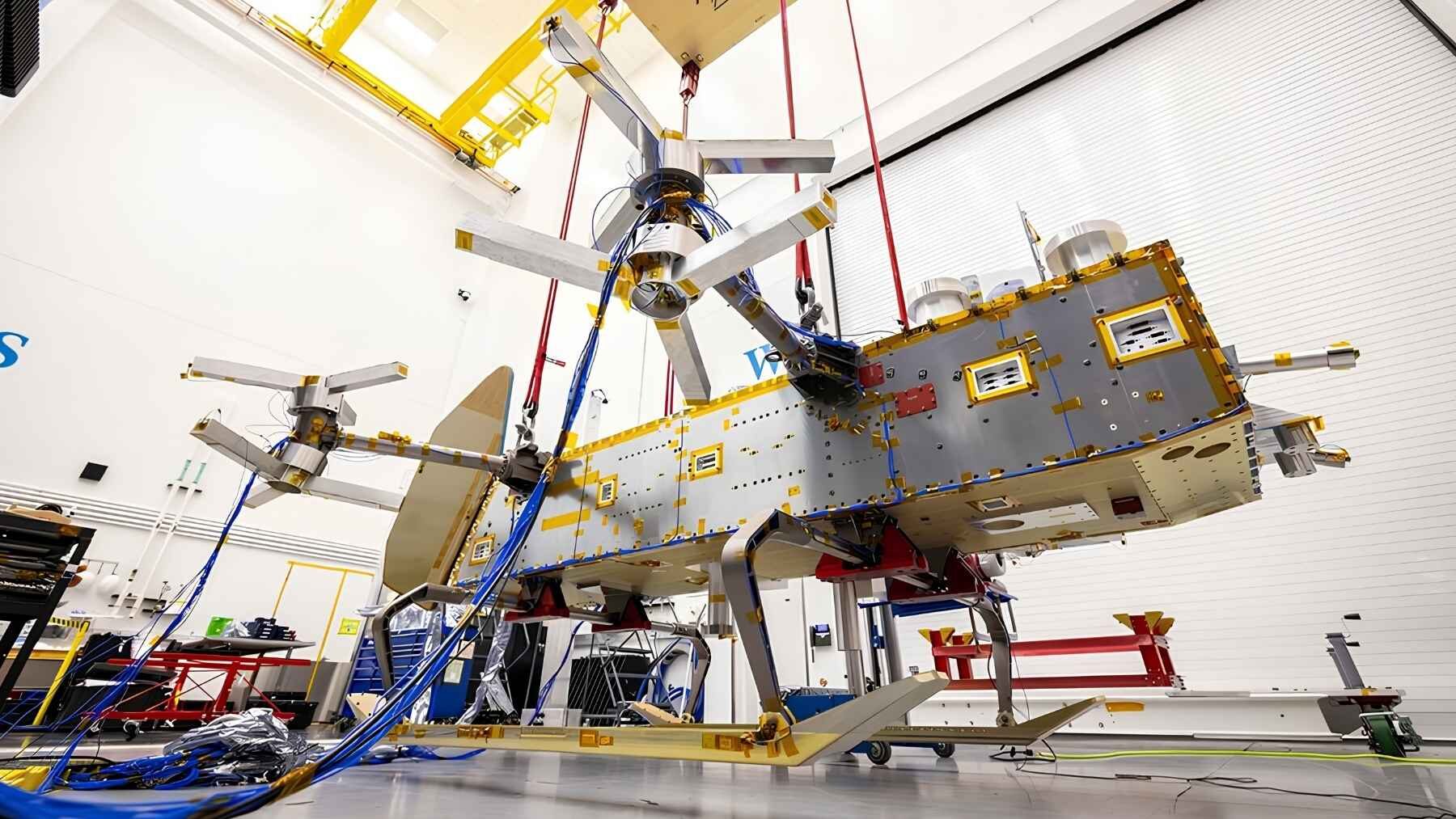 NASA's Dragonfly spacecraft suspended by bungee cords during ground vibration testing at Johns Hopkins APL.