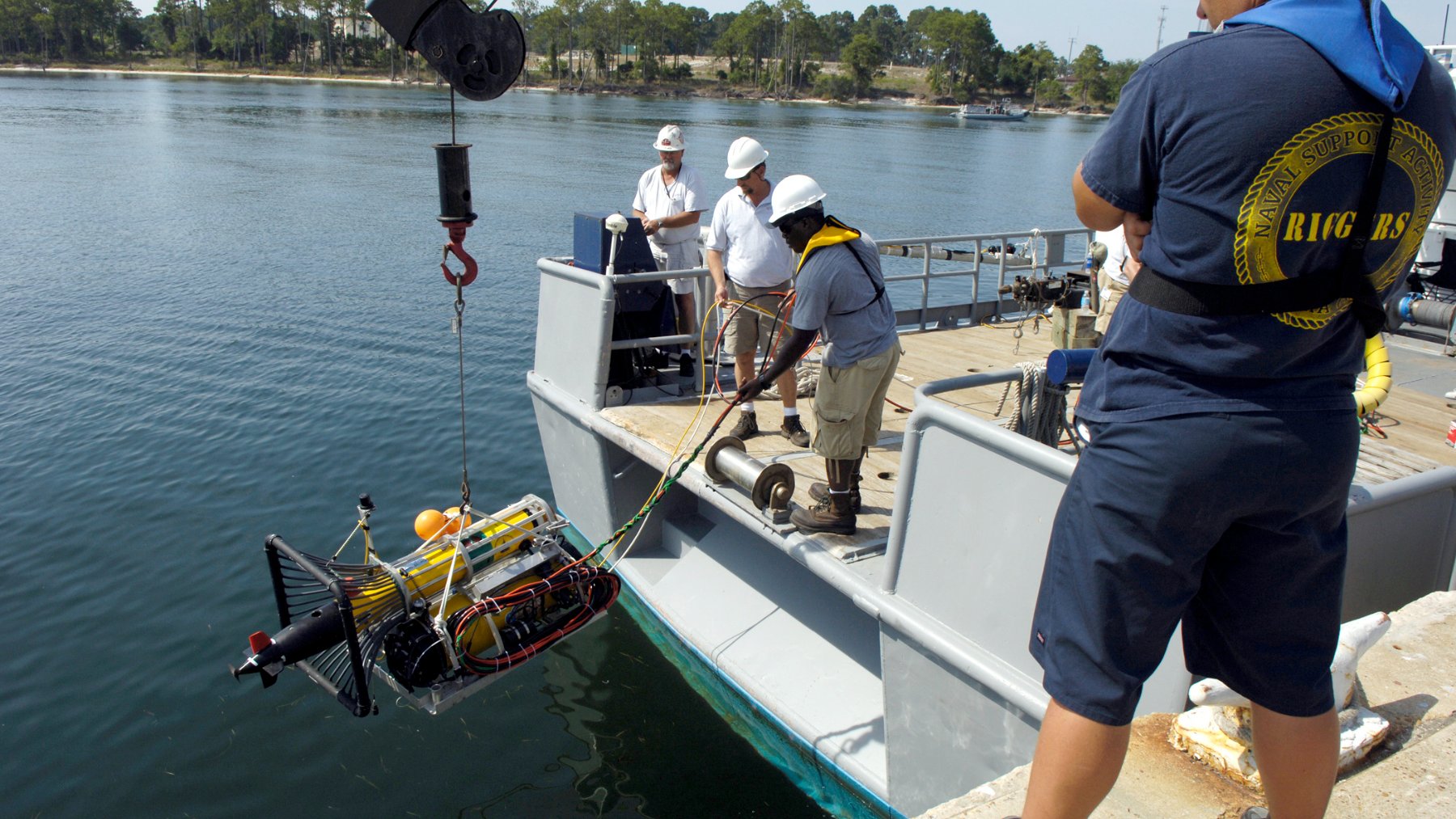 Autonomous underwater vehicle being prepared for launch at a test event