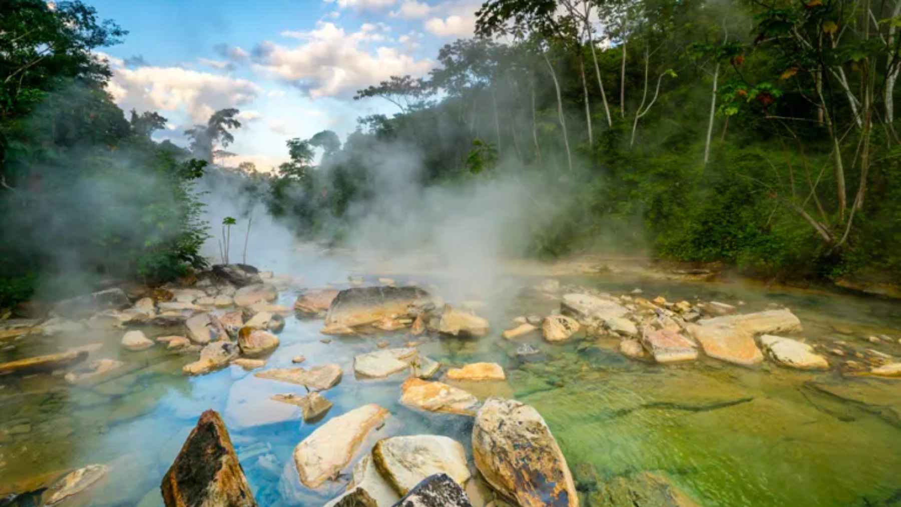 Steam rising from the Shanay-Timpishka, the Boiling River in the Peruvian Amazon.