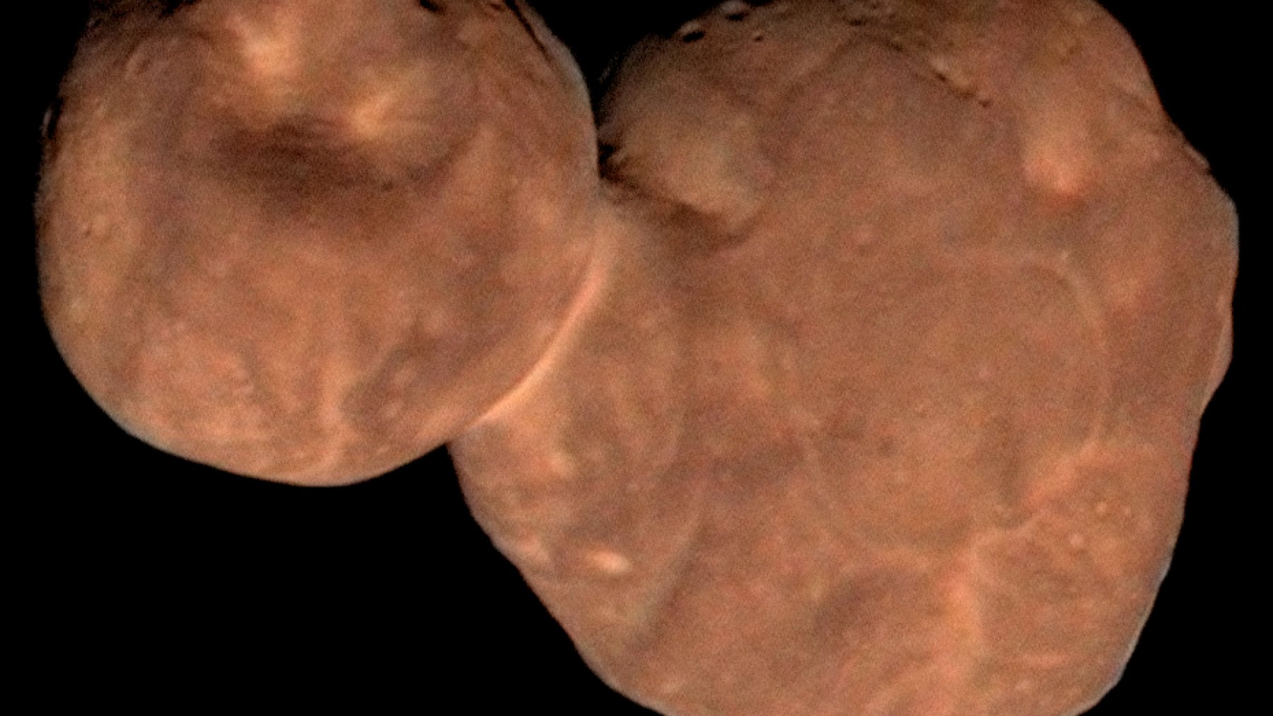 Reddish two-lobed Kuiper Belt object Arrokoth photographed by New Horizons