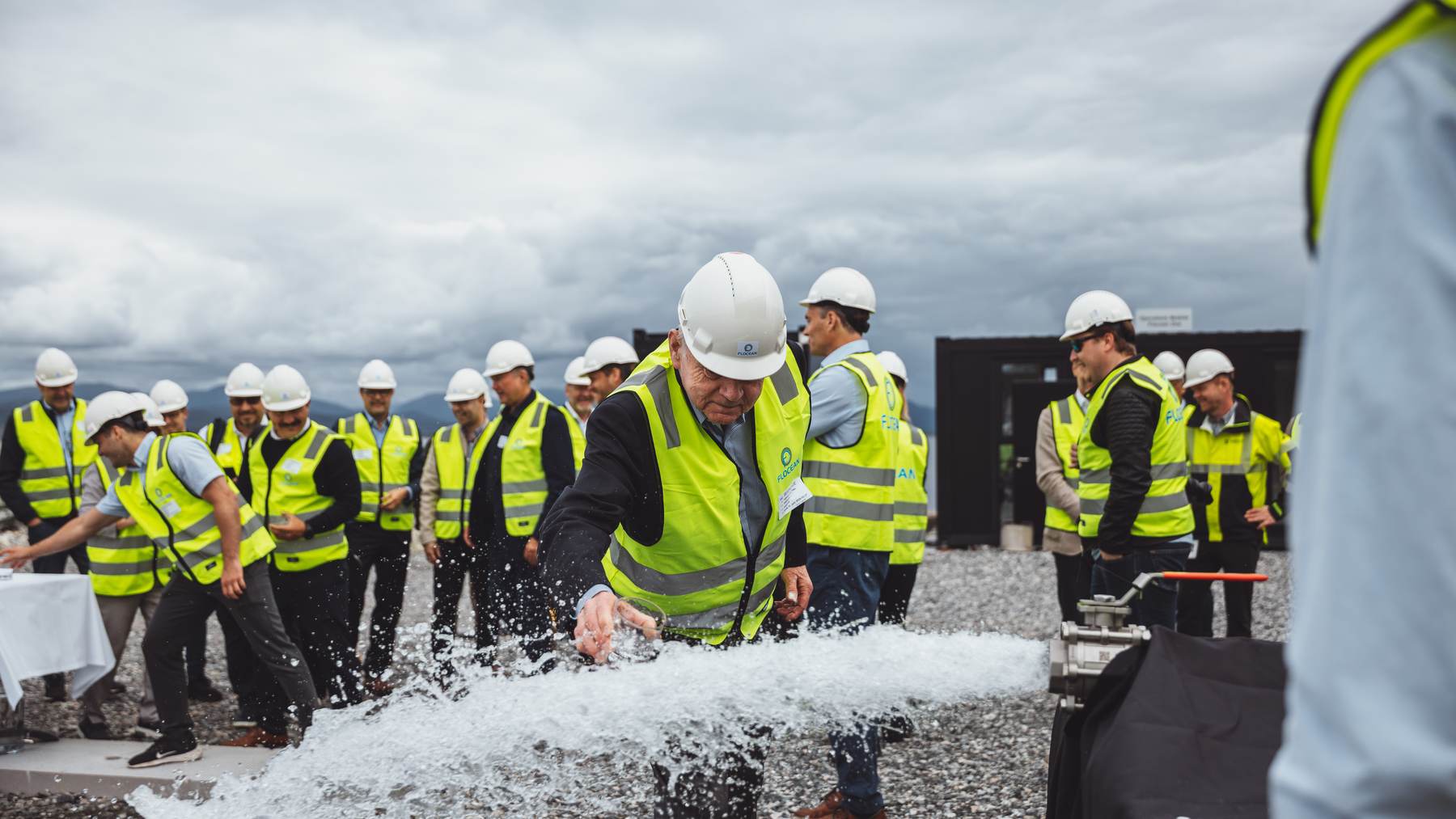 Flocean staff and local officials sample the first drinking water produced by the Flocean One subsea desalination pod in Mongstad, Norway.