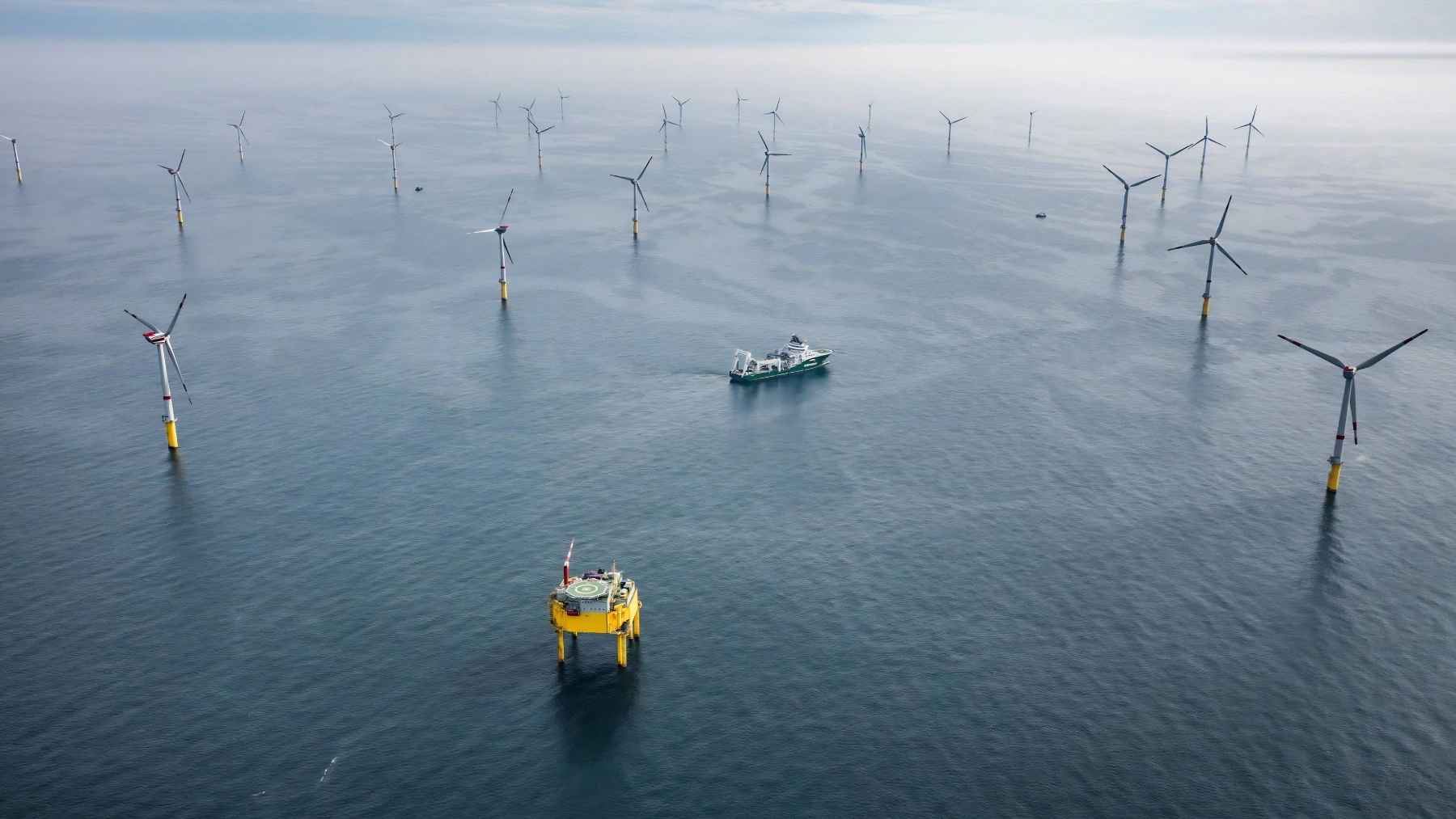Aerial view of offshore wind turbines at the Global Tech I wind farm in the North Sea.