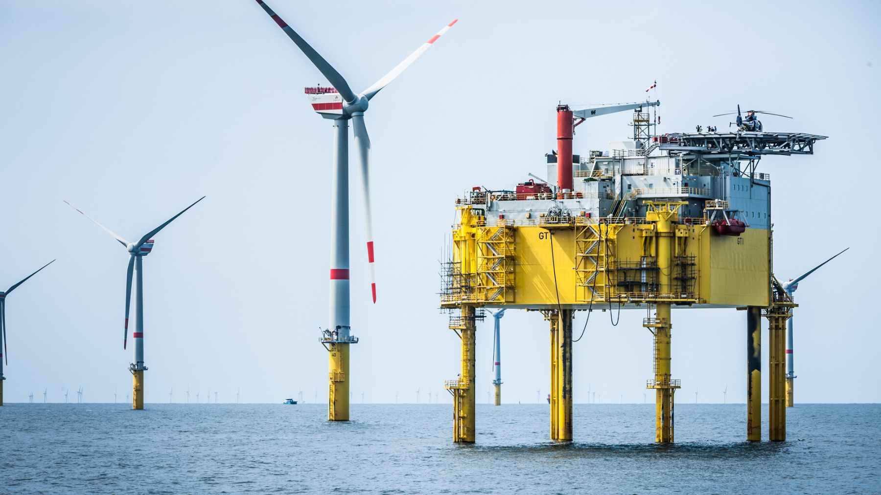 Offshore platform and wind turbines at the Global Tech I wind farm in the German North Sea.