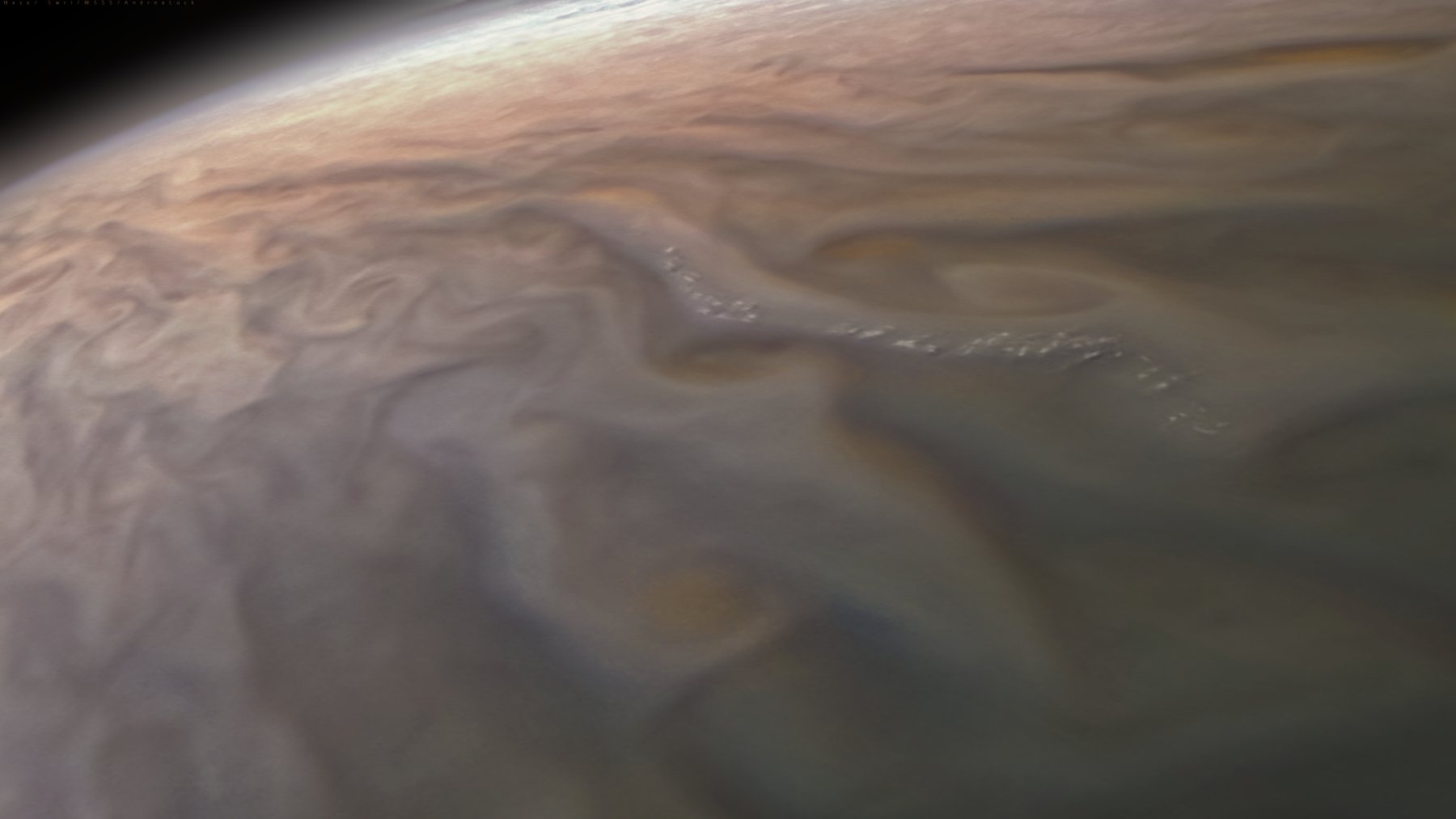 Swirling cloud bands of Jupiter photographed by NASA’s Juno spacecraft