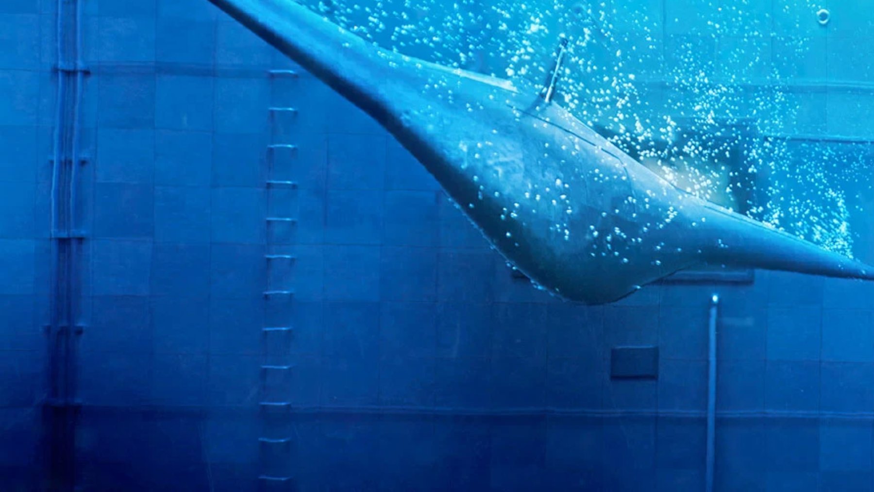Northrop Grumman Manta Ray uncrewed underwater vehicle gliding through blue water