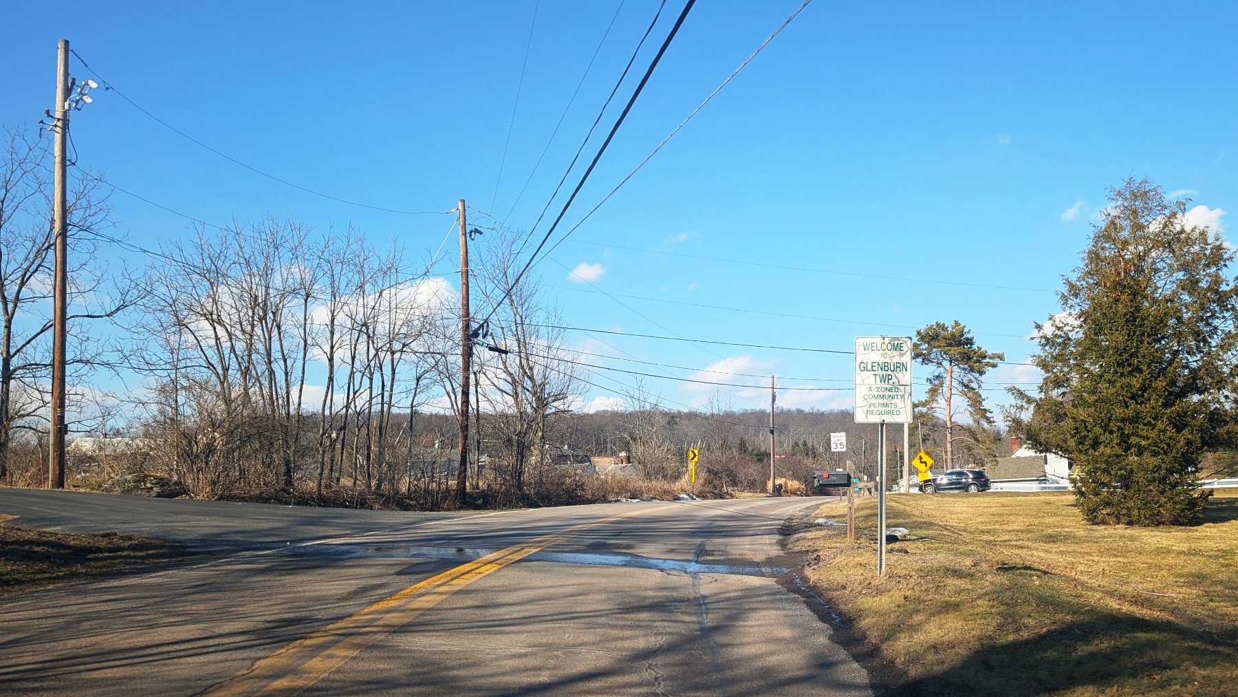 Gravel road through rural Pennsylvania on a winter afternoon