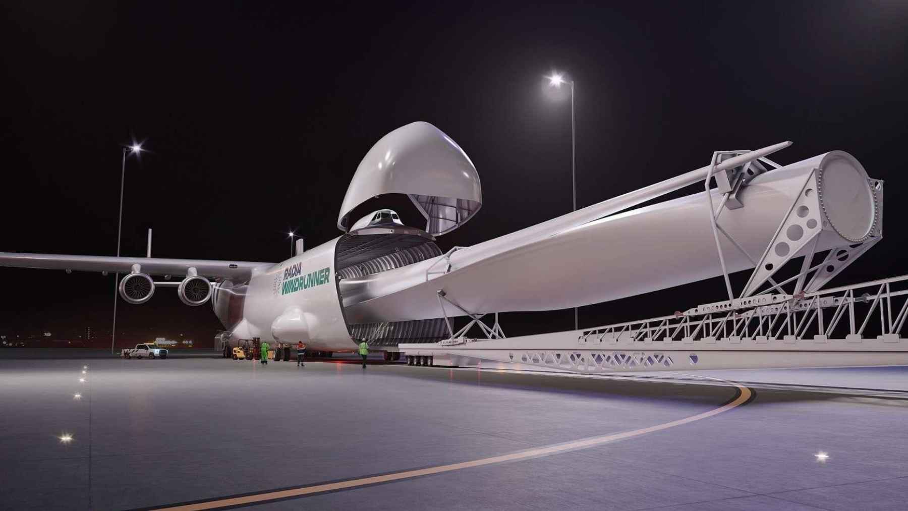 Concept rendering of Radia’s WindRunner cargo aircraft loading a giant wind turbine blade at night