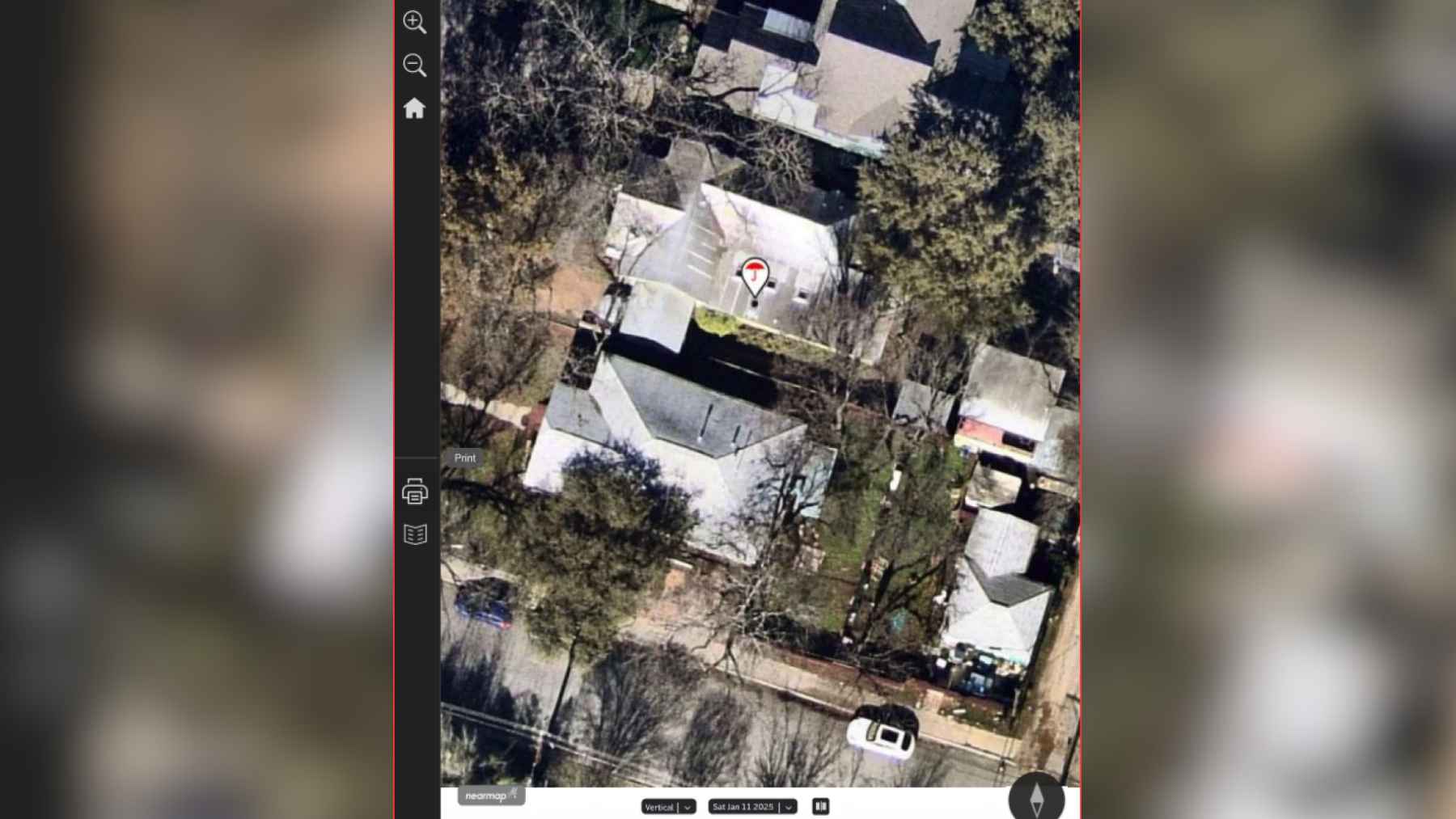 Aerial image of Tracy Gartenmann's Austin home used by Travelers Insurance to flag tree branches near the roof.