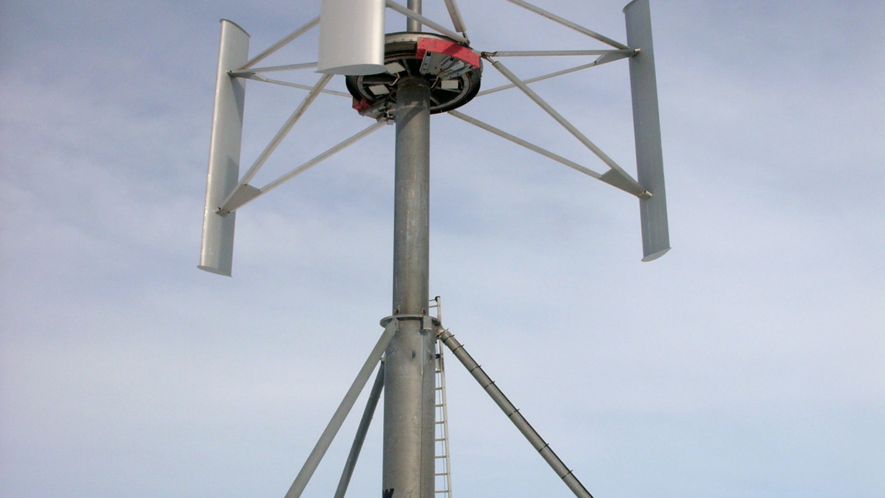 Wind turbine standing in the snow at a research station in Antarctica