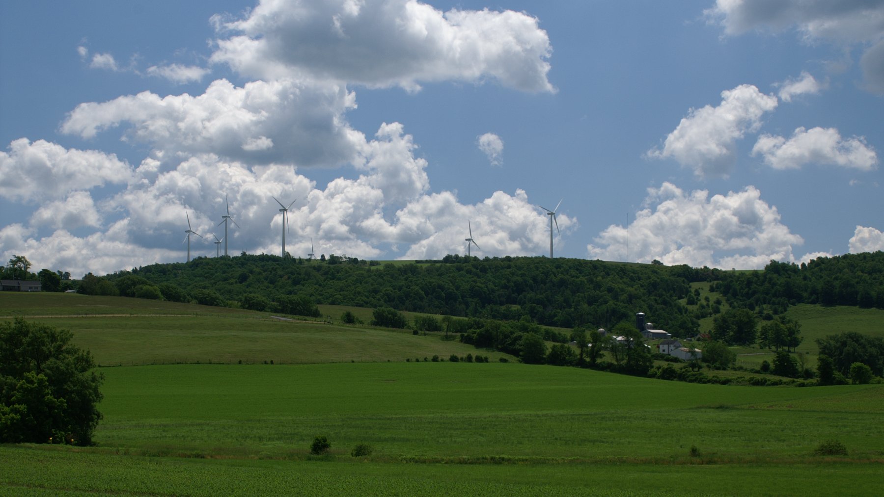 Wind turbines standing on farmland near Madison, New York
