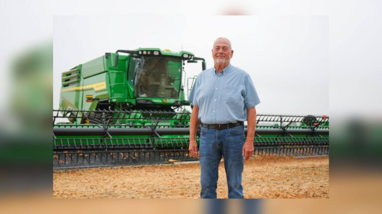 Conservation Farm Family Award winner Bill Kellogg of Hardin County, Ohio, standing in front of a combine