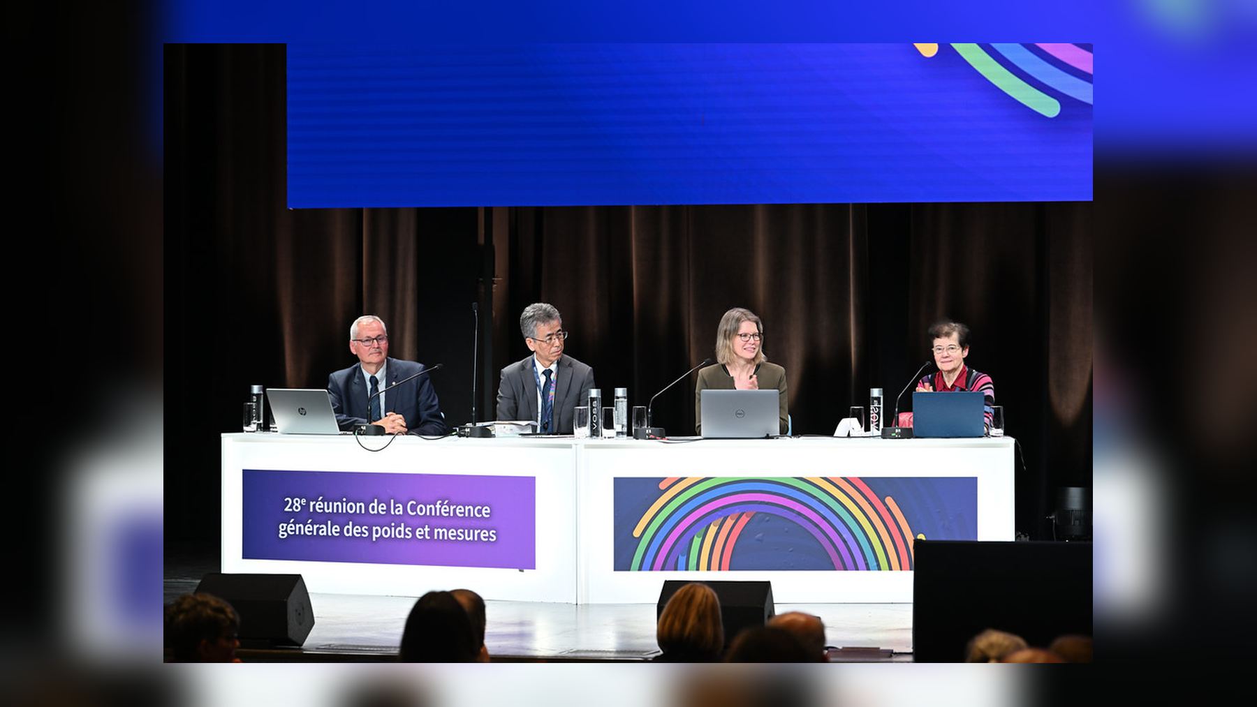 Head table at the 28th General Conference on Weights and Measures in Versailles, where leap seconds were ended