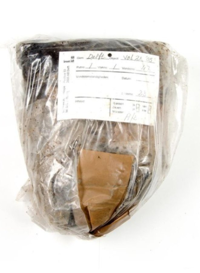 Labeled plastic bag of excavated cesspit material from Delft awaiting archaeobotanical analysis