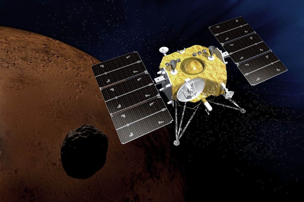 Artist's impression of Japan's MMX mission spacecraft flying over Mars's moon Phobos, with Mars in the background