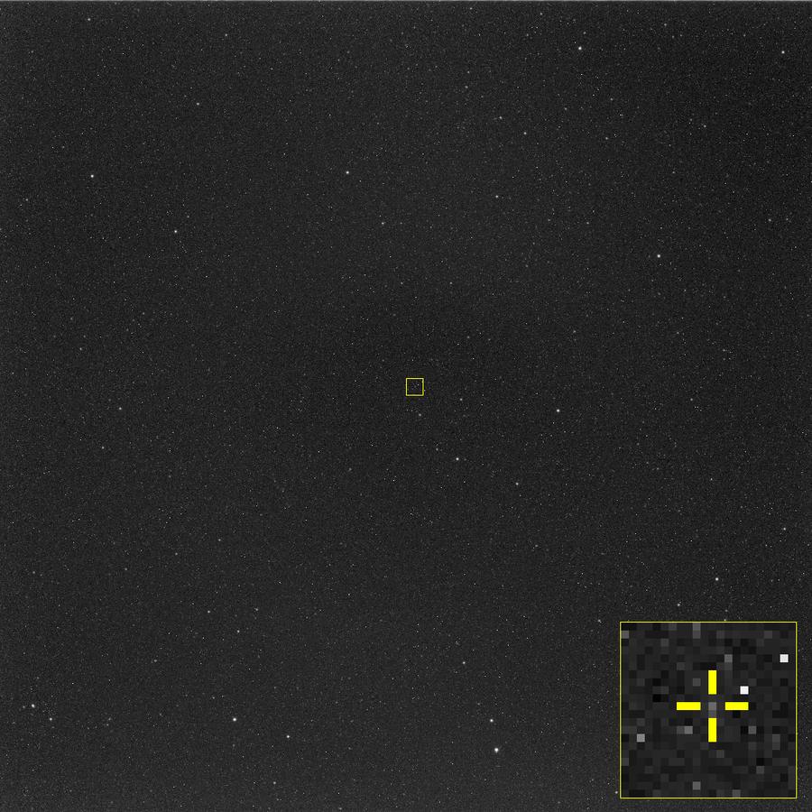 Star field from the Hera spacecraft's camera with a yellow box marking the faint dot of the Didymos asteroid system