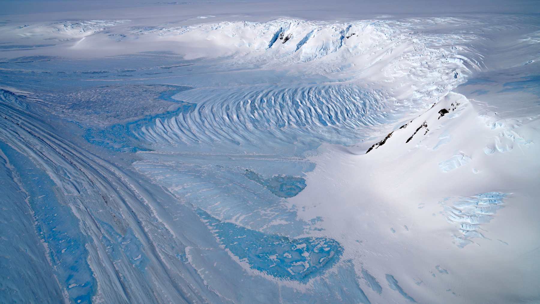 Ice flowing from the Transantarctic Mountains, where geologists link buried mountain roots to the Cambrian explosion